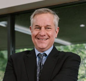 portrait image of client Thomas E.