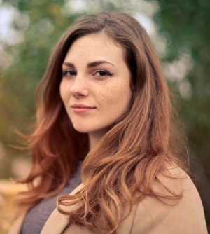 Portrait image of supreme coating client Angela R.