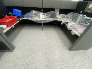Manufacturing facility epoxy flake after showcasing durable high gloss finish for residential and commercial spaces