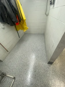 Manufacturing facility epoxy flake showcasing durable high gloss finish for residential and commercial spaces